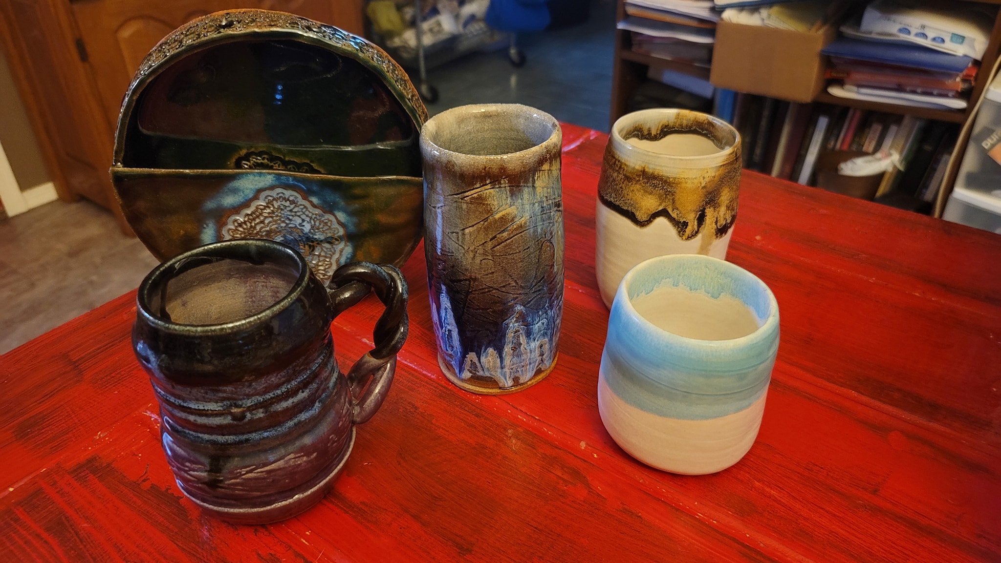 We love collecting local handmade crafts and art! Found this potter at Southside