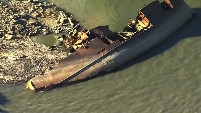 Low Mississippi River levels expose sunken WWII ship